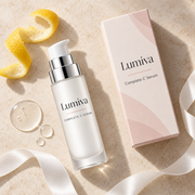 Lumiva Complete C Serum bottle and packaging flat lay